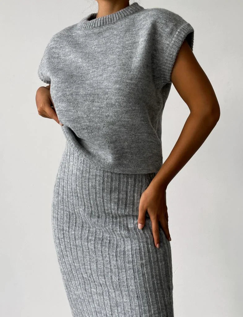 CAVELLI ™  | CARDIGAN SANS MANCHES ET JUPE EN MAILLE